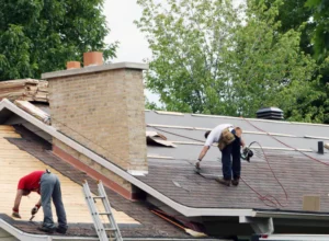 workers doing roof repair